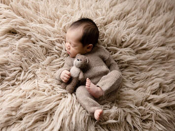 Our newborn photography Calgary service always provides customized and creative sessions